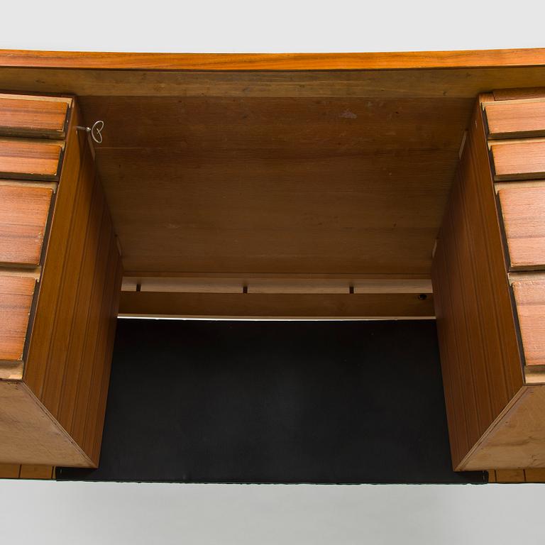 a 1960s writing desk made to order.
