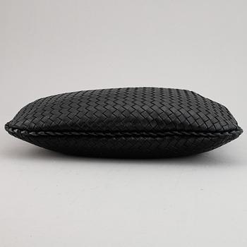 Bottega Veneta, a black leather bag.