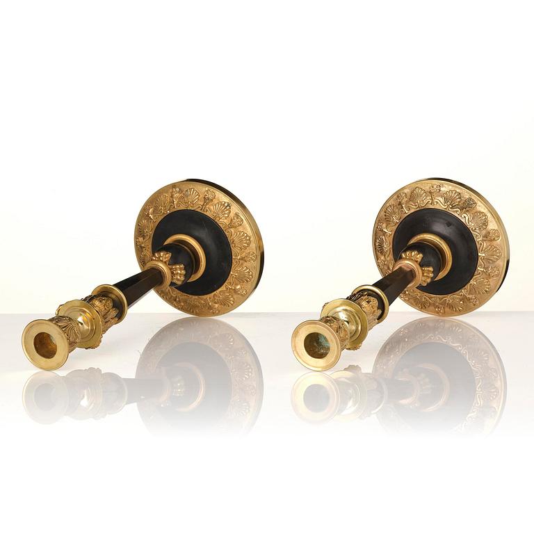 A pair of Empire presumably Russian, Moscow candlesticks from around 1820.