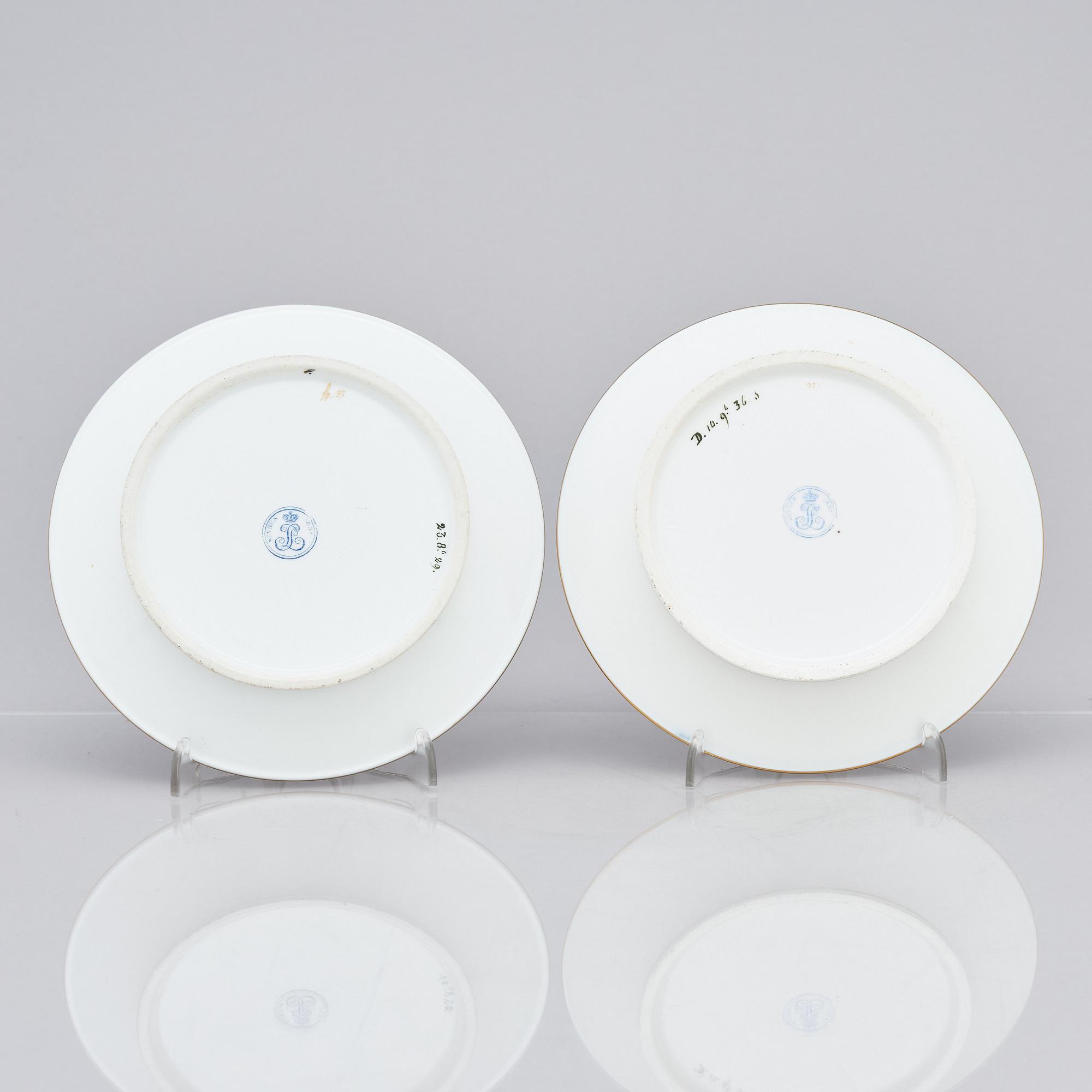 A pair of Sèvres cups with stands, 19th Century.