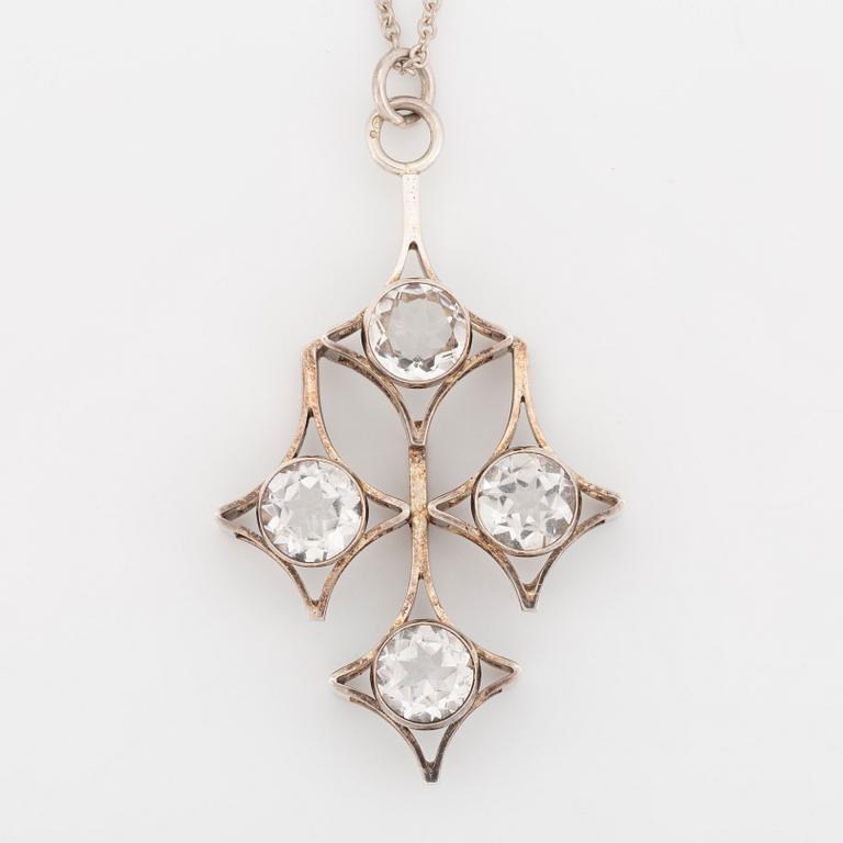 Kultasepät Salovaara, sterling silver bangle and pendant with rock crystal and syntehtic white spinel.