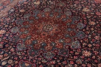 A semi-antique Kashan 'Dabir' carpet, central Persia (Iran), c. 437 x 299 cm.