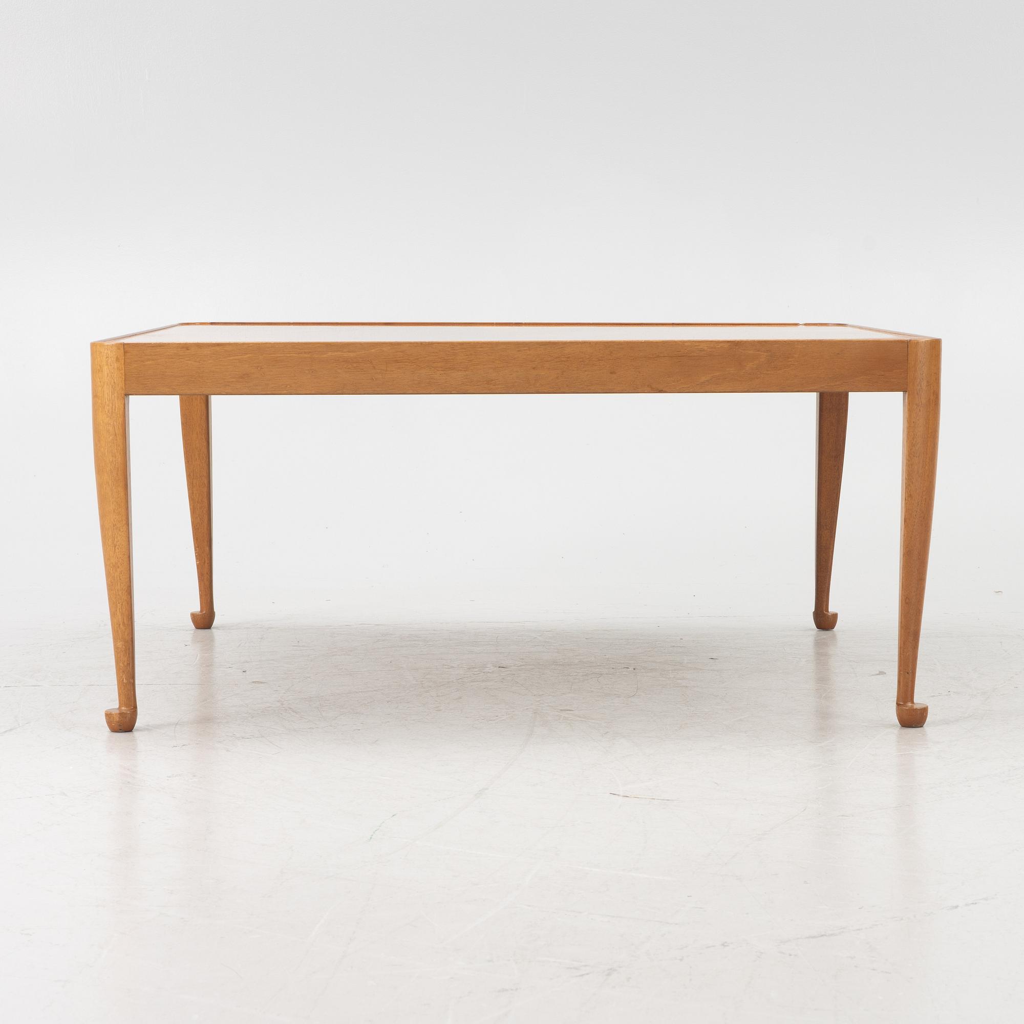 Josef Frank, a 'Diplomat' coffee table, model 2073, Firma Svenskt Tenn, prior to 1985.