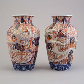 A pair of Japanese porcelain vases, 19th Century.