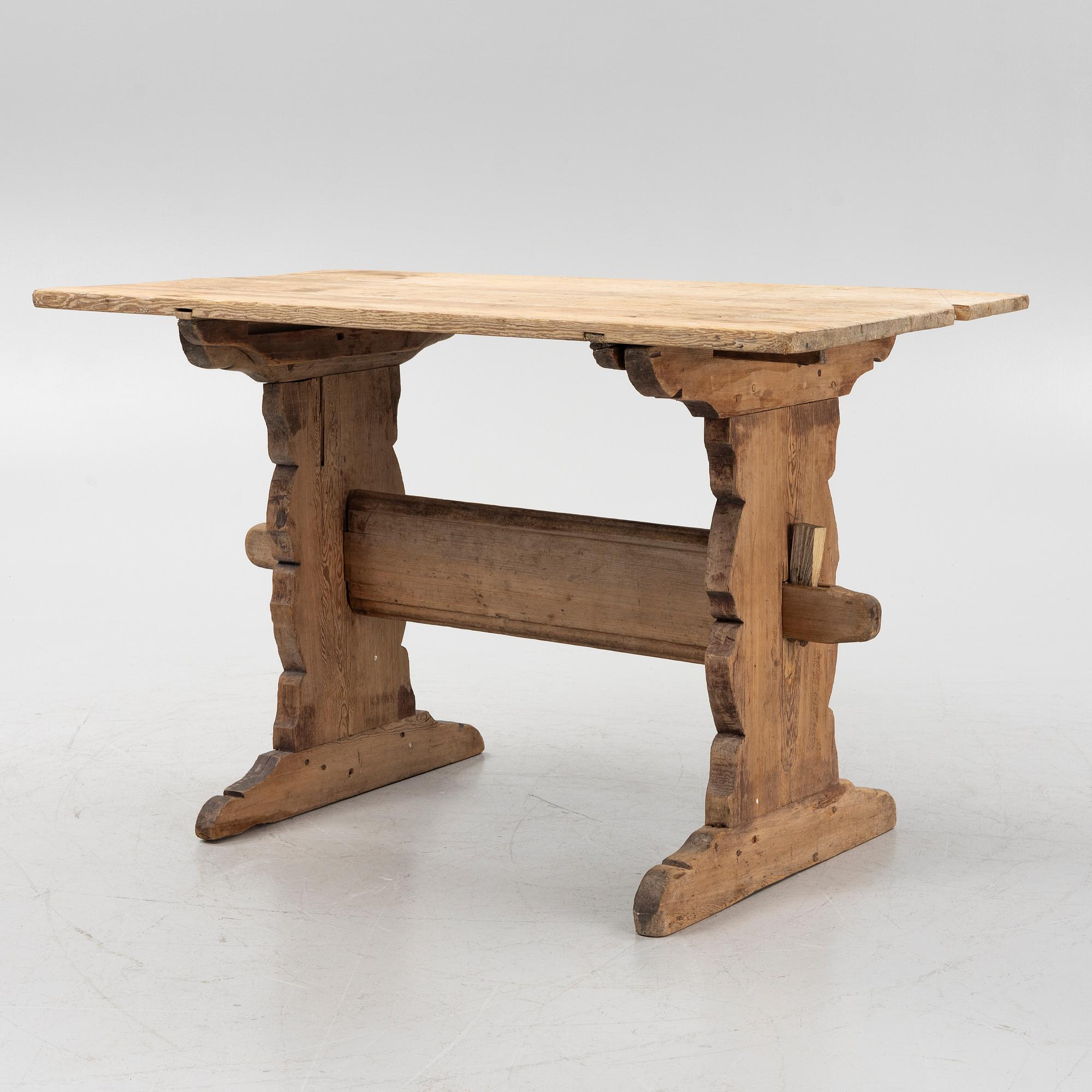 A pine trestle table, 19th century.