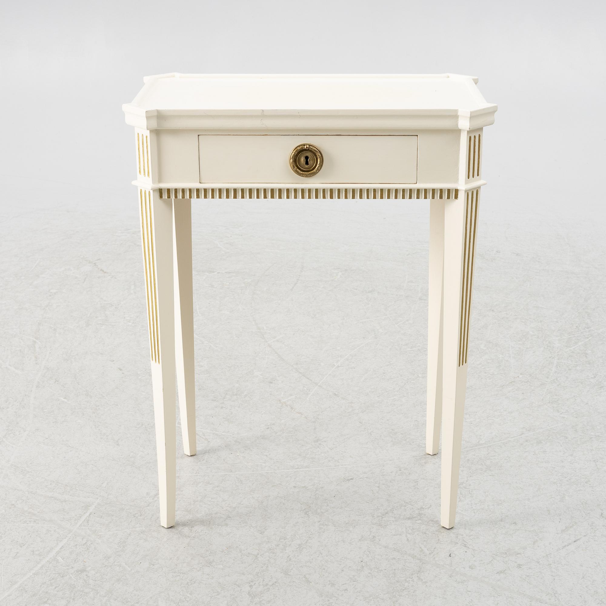 A Gustavian style side table, early 20th century.