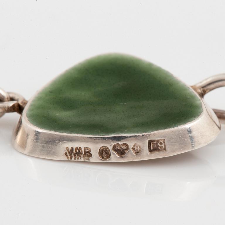 A WA Bolin silver bracelet with green enamel.