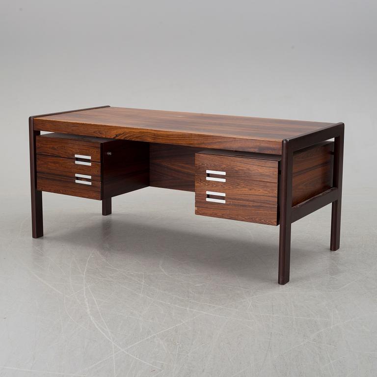 A palisander veneered desk by Dyrlund-Smith, Denmark, 1960's.