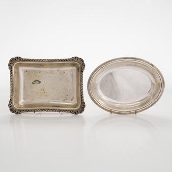 A set of four silver plated entree dishes, England.