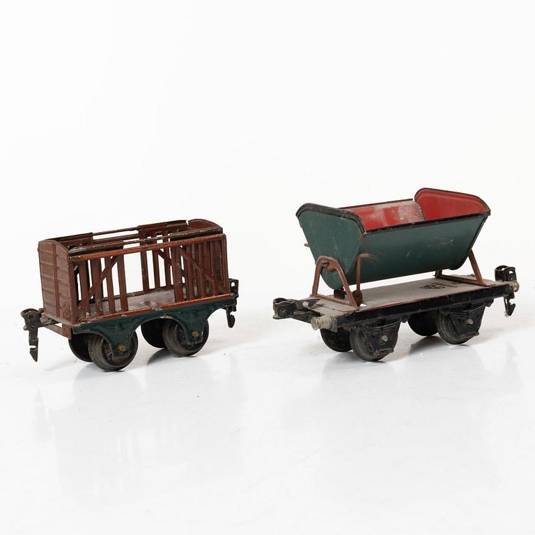 Model train with track and station building, 13 pieces, Germany, 1920s.