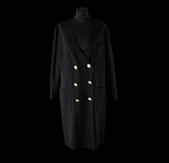 A 1970s black knitted wool coat dress by Yves Saint Laurent.