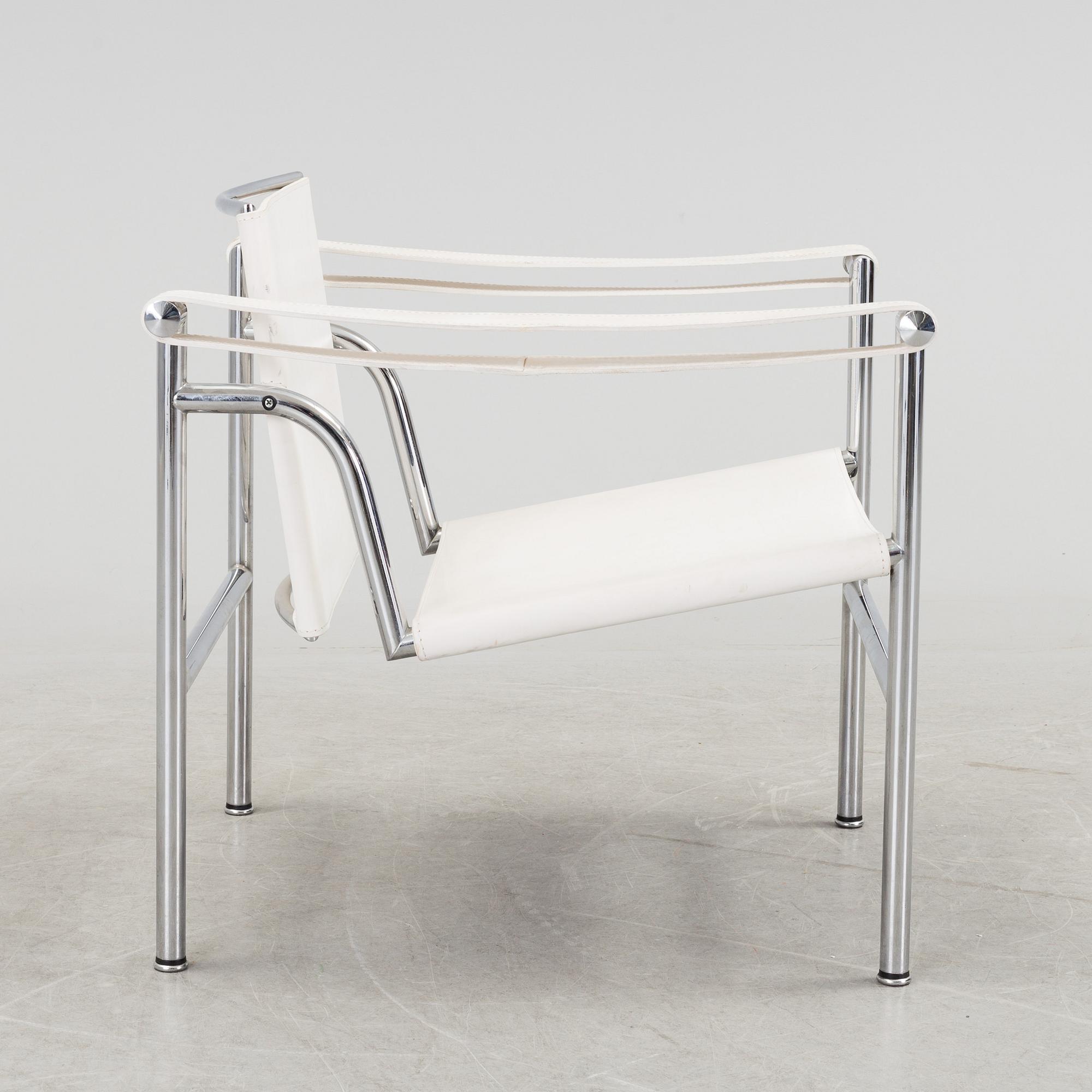 A "LC-1" ARMCHAIR DESIGNED BY LE CORBUSIER FOR CASSINA.
