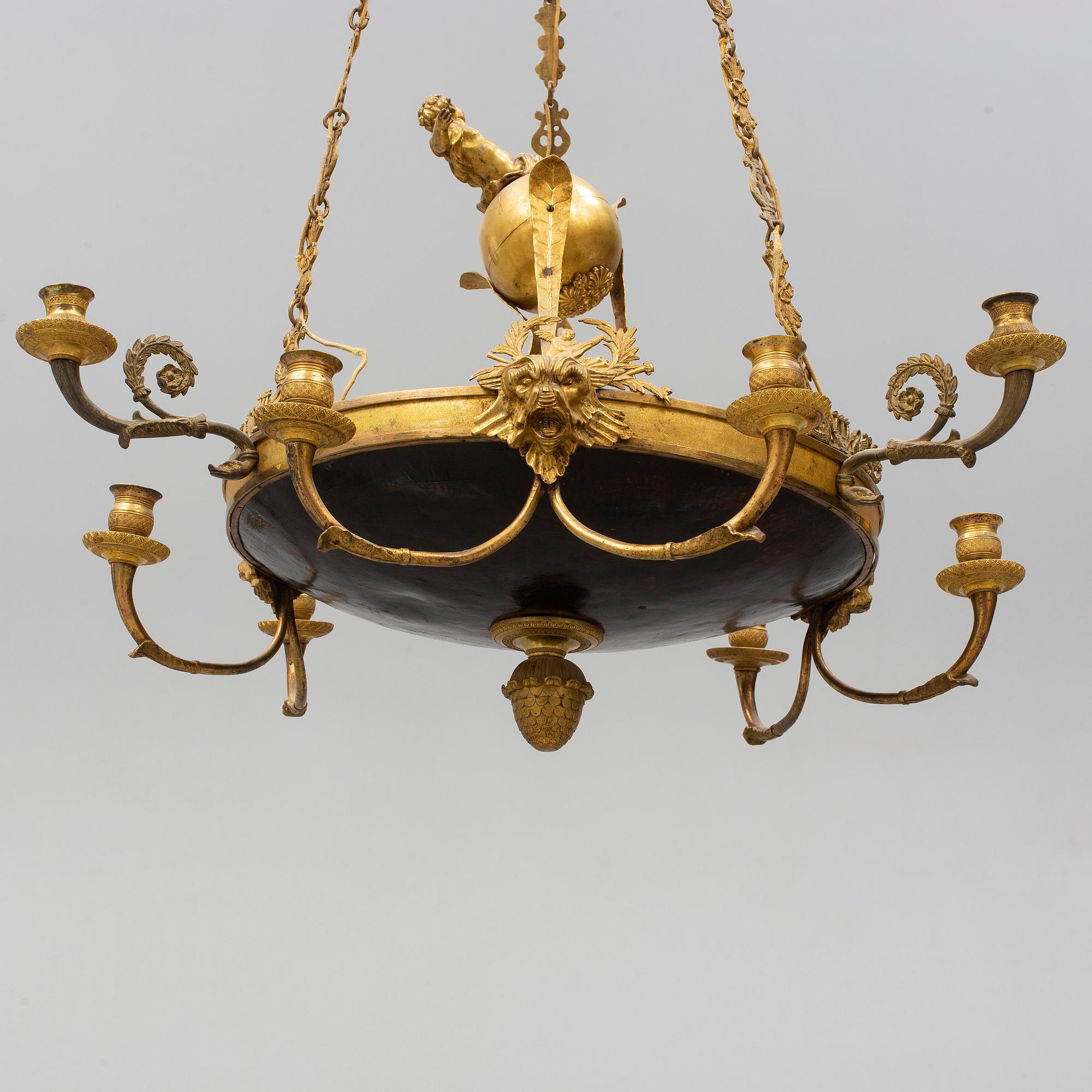 An Empire-style nine-light hanging lamp, late 19th century.