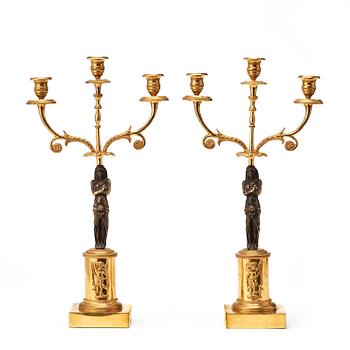 591. A pair of late Gustavian circa 1800 three-light candelabra.