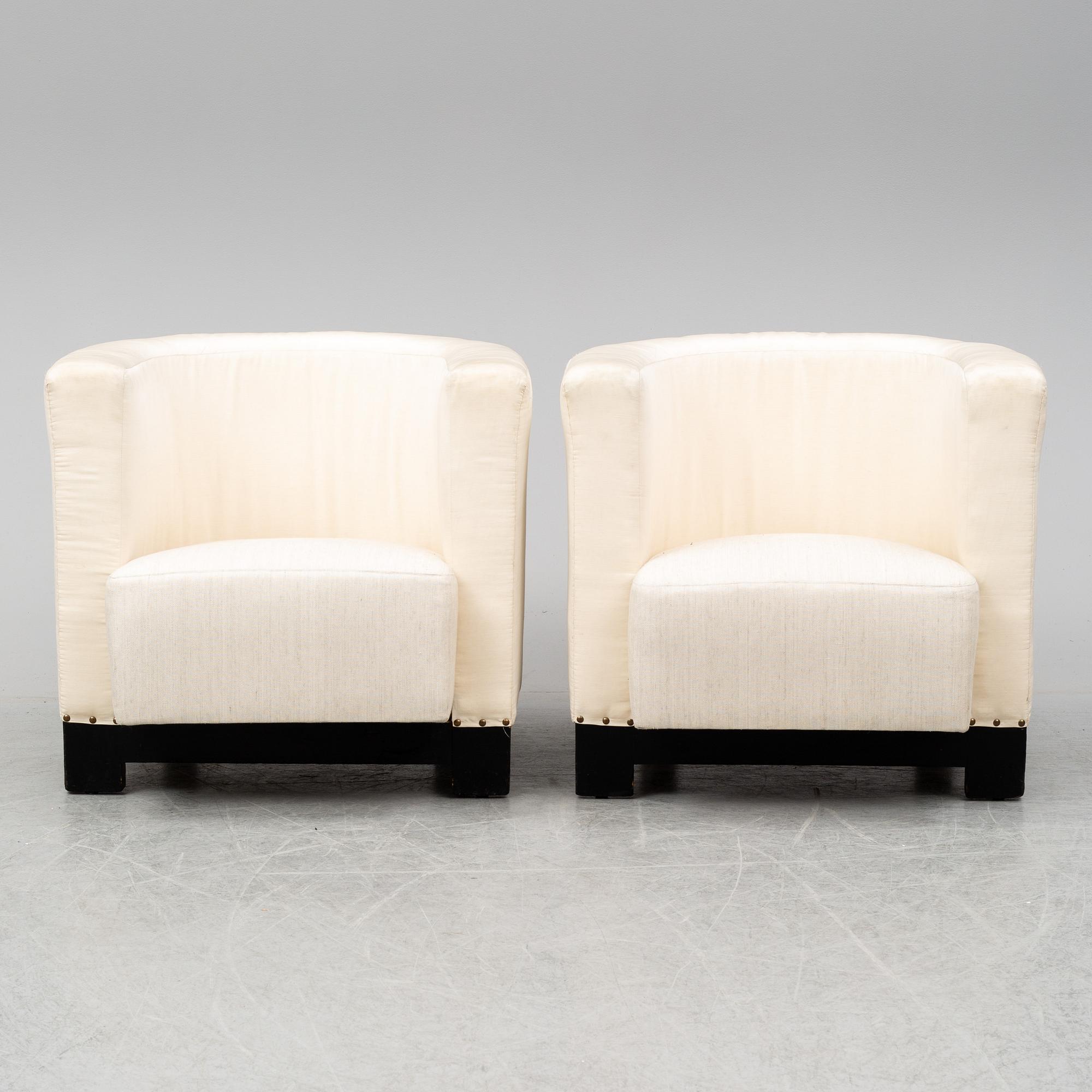 A pair of Italian easy chairs, late 20th Century.
