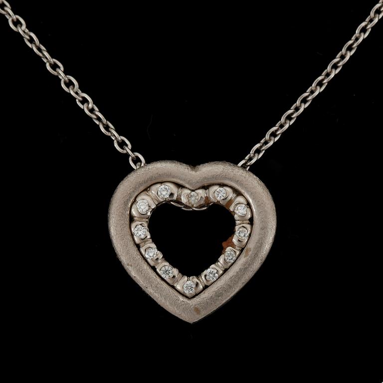 HÄNGE samt kedja, 18k vitguld med briljantslipade diamanter, enligt gravyr tot 0,12 ct. Total vikt ca 8,2 gram.
