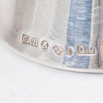 Three silver candelabra, GAB, Stockholm 1967, and Thore Eldh for Ceson, Gothenburg 1977.