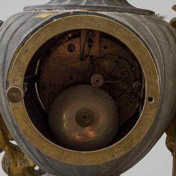 An end of the 20th century metal case mantle clock.