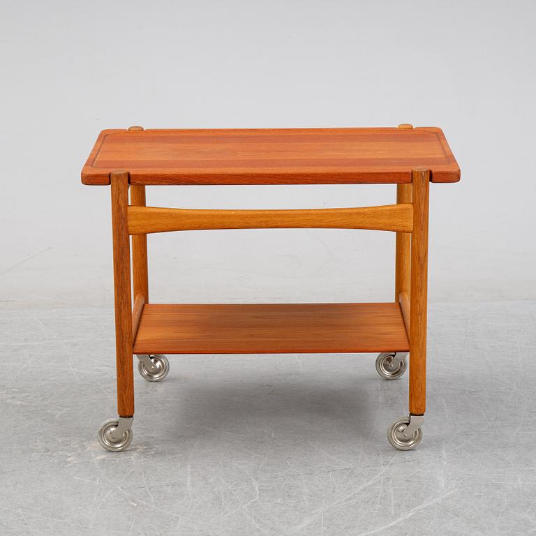 Hans J Wegner, a teak serving trolley, for för Andreas Tuck, Denmark, mid 20th century.