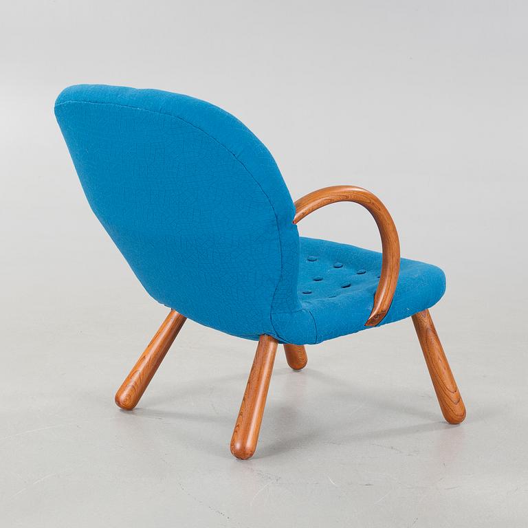 A "Clam Chair" / "Muslinge" chair, attributed to Philip Arctander, mid 20th cenutry.