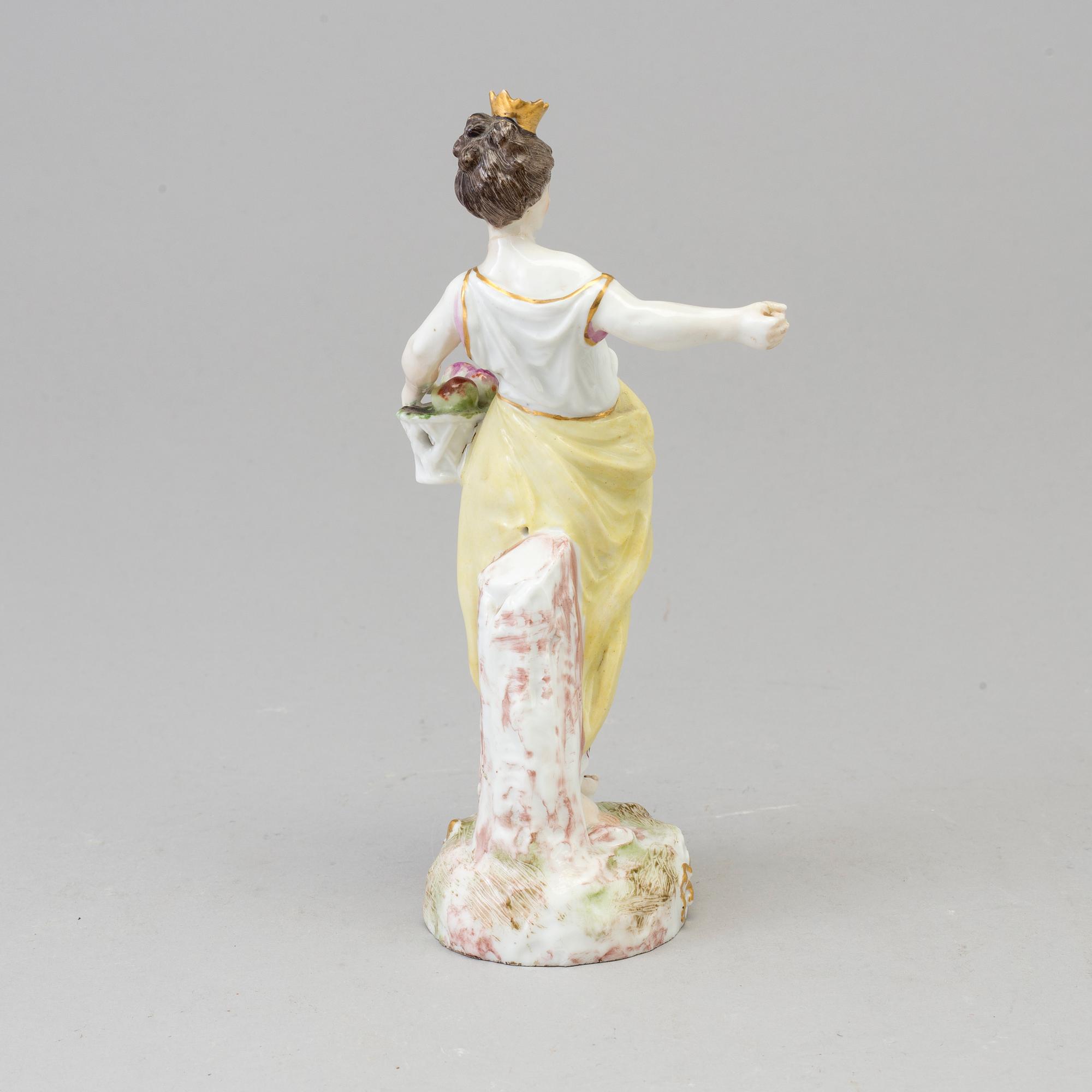 A Samson figure of a woman with a flower basket, Paris, France 20th Century.
