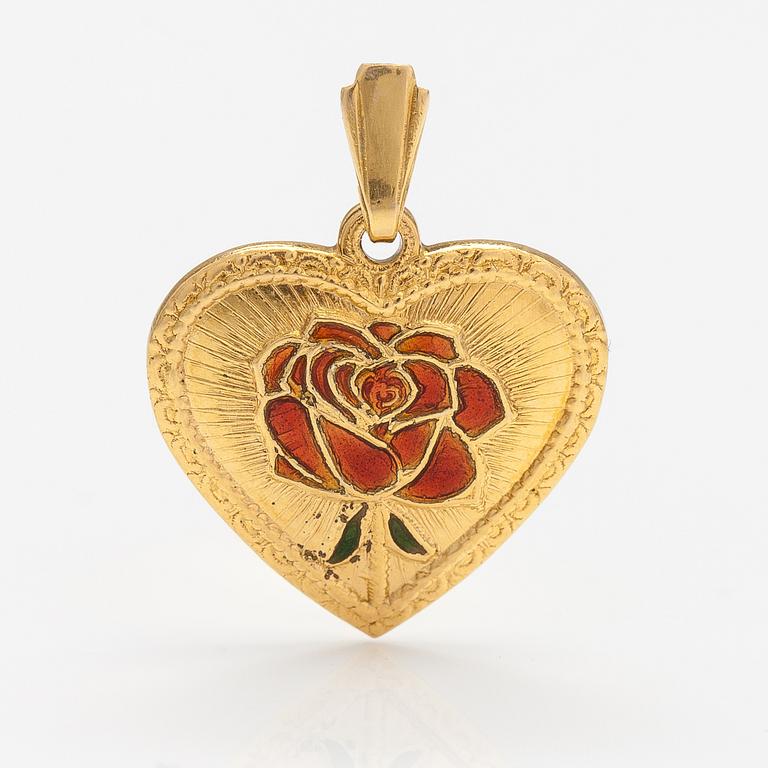 A 14K gold heart shaped pendatn with a rose in enamel.