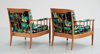 A pair of Kerstin Hörlin-Holmquist 'Skrindan' mahogany armchairs, OPE Möbler, Sweden.