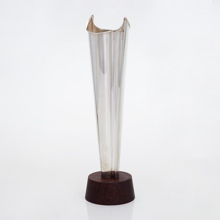 Tapio Wirkkala, a 'Liekki' (Flame) silver vase on a rosewood base, model TW 228,  Kultakeskus, Hämeenlinna 1962.