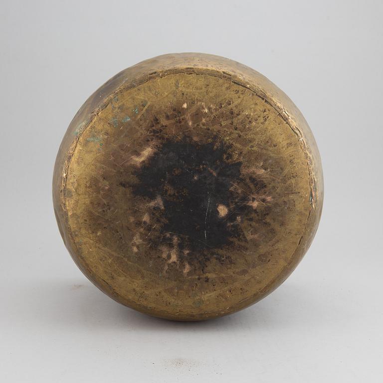 A large 18th century brass cauldron.