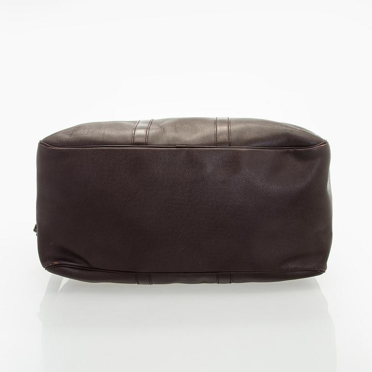 Louis Vuitton, a 'Taiga Kendall PM' weekend bag.