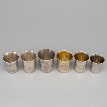 A set of six Russian 19th century parcel-gilt silver vodka cups.