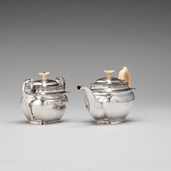 A Baltic 19th century parcel-gilt silver tea-pot and sugar casket, mark of Reinhold Eckert, Riga 1828.