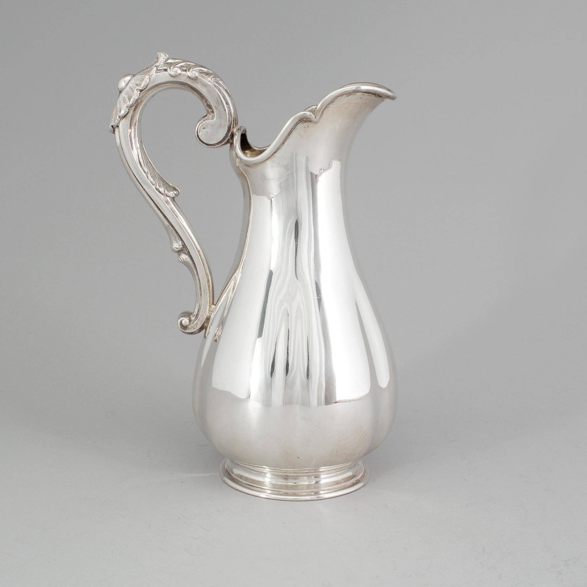 A Swedish silver water pitcher, maker's mark Gustaf Theodor Folcker, Stockholm, 1860. Weight 647 g.
