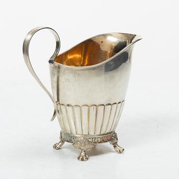 A Swedish silver coffee pot, cream jug and sugar box, Gustavian style, mark of AG Dufva, Stockholm 1911-1912.