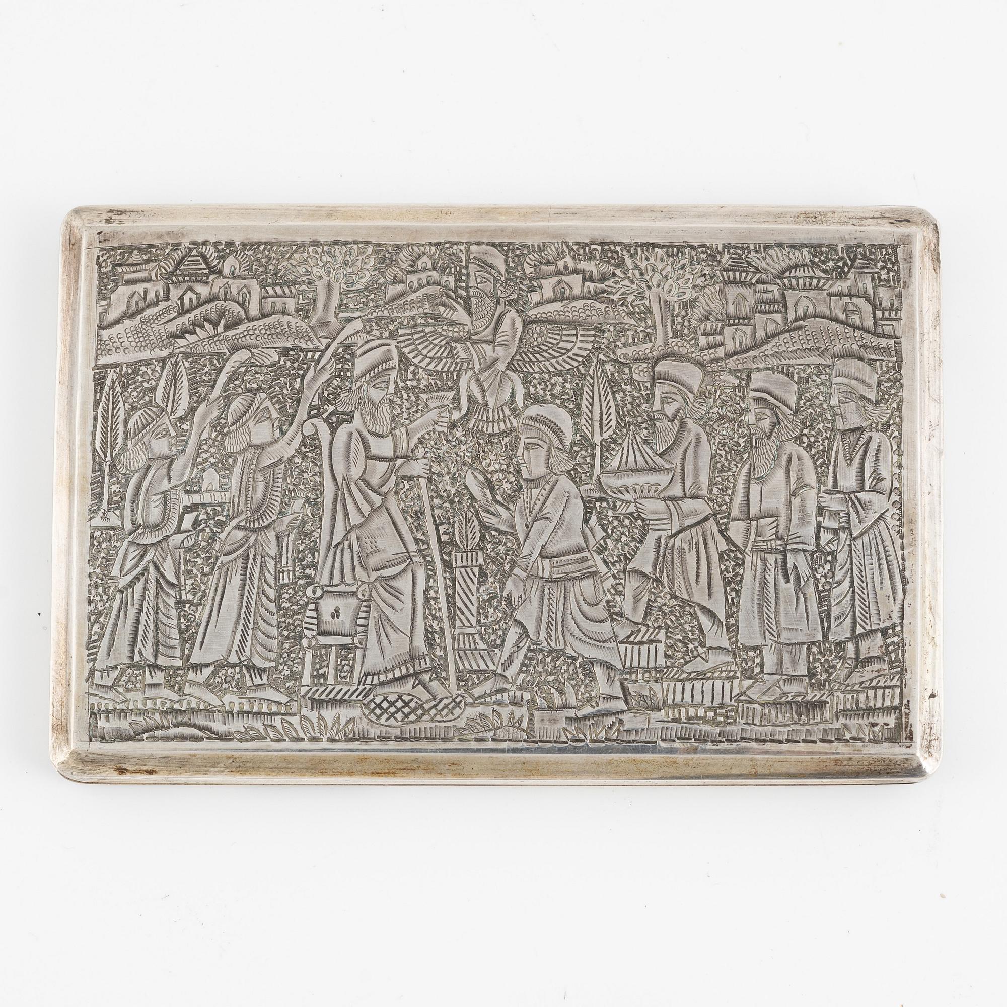 A silver cigarette case, Iran, first half of the 20th Century.