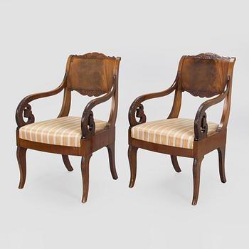 A pair of open armchairs from the 1920-30s.