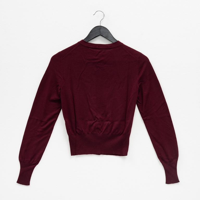 Alaïa, a burgundy wool twin set with cardigan and top, French size 38.