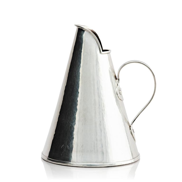 G H Markenius, a silver pitcher with handle, Stockholm 1957.