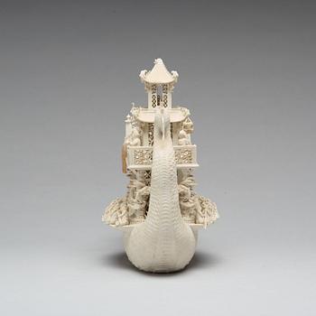A biscuit porcelain dragon boat of 'Assembly of Immortals', Qing dynasty, Daoguang, signed Chen Guozhi, 19th century.