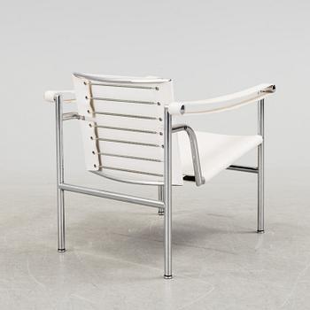 A "LC-1" ARMCHAIR DESIGNED BY LE CORBUSIER FOR CASSINA.