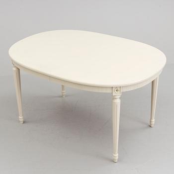 A 20th century Swedish Gustavian style dining table.