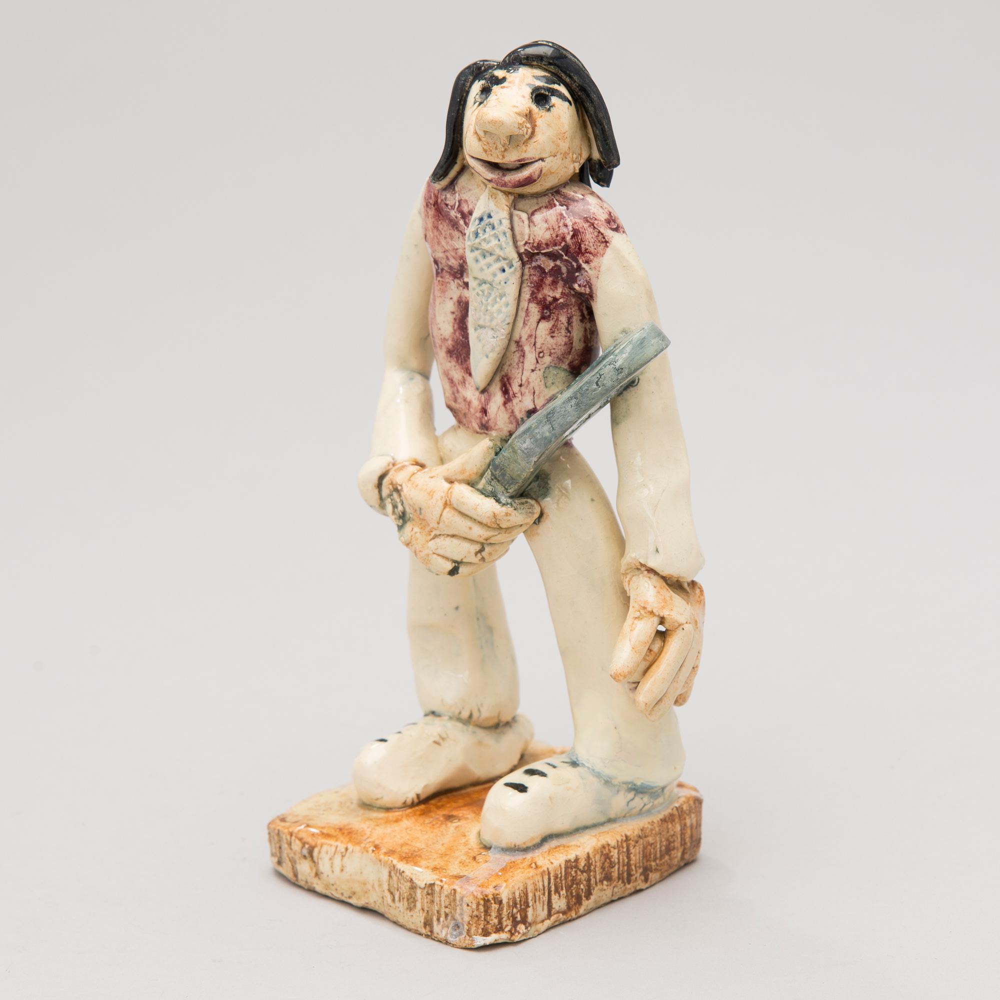 A 1930s ceramic sculpture signed Aja Arabia, Made in Finland.