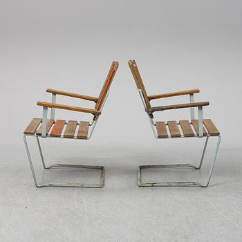 A pair of Grythyttan garden chairs.