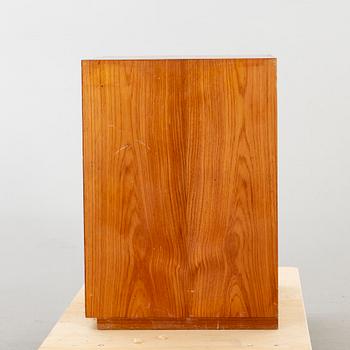 A teak veneered chest of drawers, designed by Olof Pira.