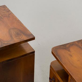 A PAIR OF MID 20TH CENTURY BEDSIDE TABLES.