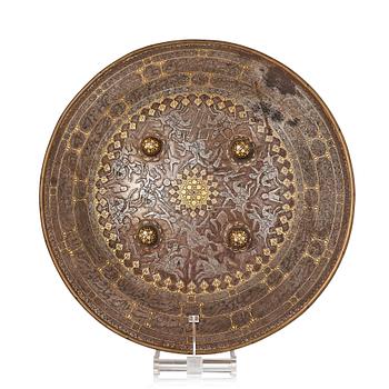 333. A gold-damascened steel shield, Qajar Iran, 19th century.