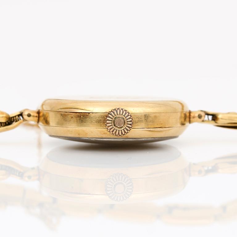 ARMBANDSUR, manuell, ur i 14K och länk i 18K guld, total vikt ca 19,8g.