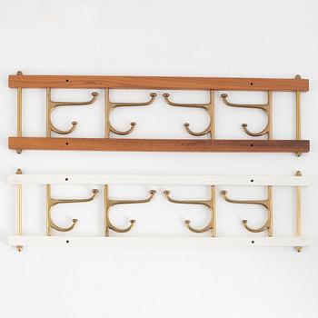 A pair of "Decorative" Clothes hangers, Skoglunds Metal Foundry, Anderstorp, mid-20th century.