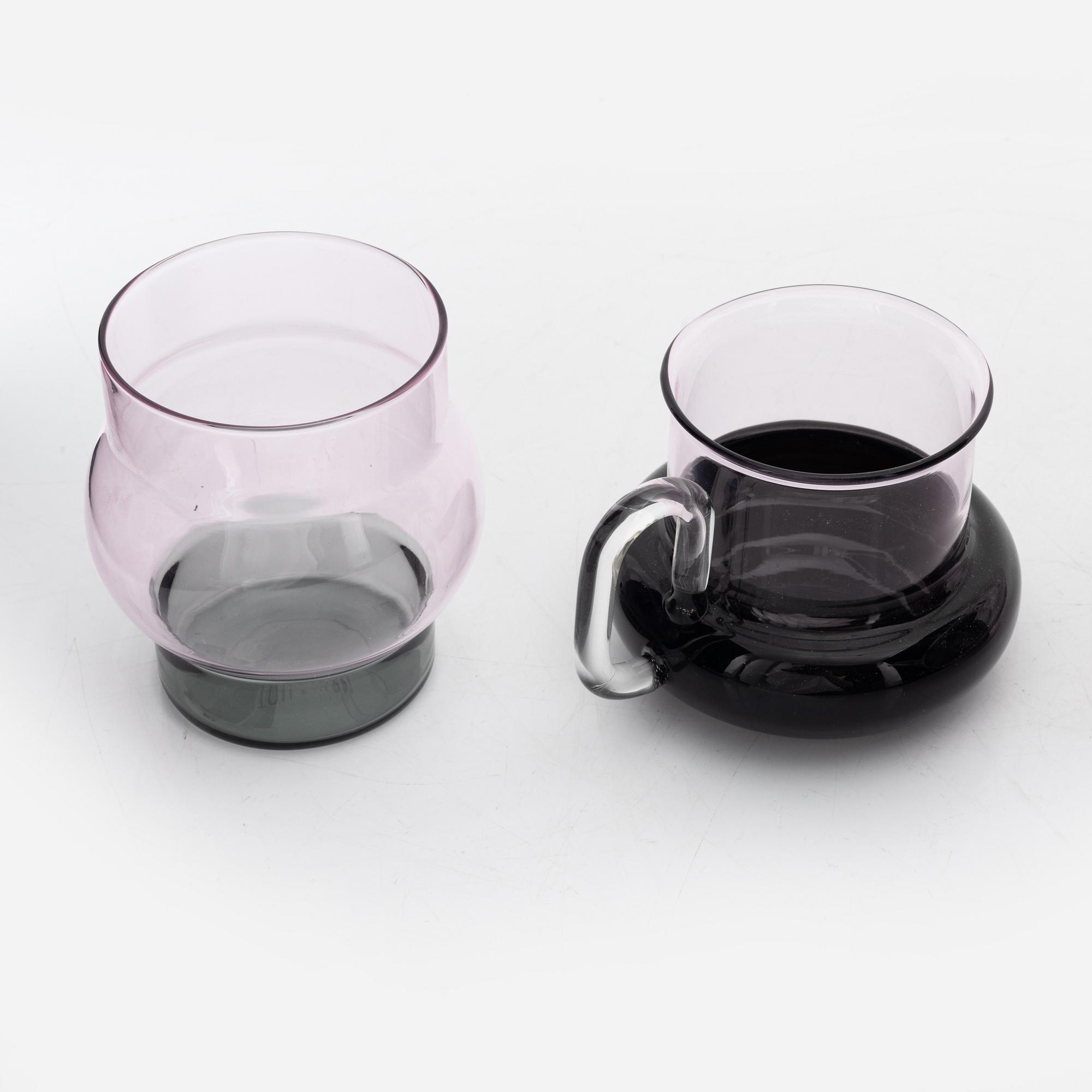 Tom Dixon, A 'Bump' glass teapot with for cups and a pair of glasses.