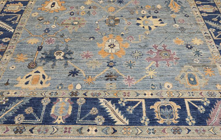 A carpet, Ziegler design, approx. 302 x 250 cm.